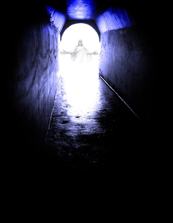 Long tunnel walkway with white light and Jesus standing at the endの写真素材