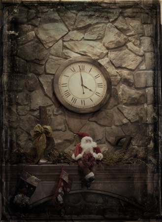 Front room decorated for christmas with antique decorations on mantleの写真素材