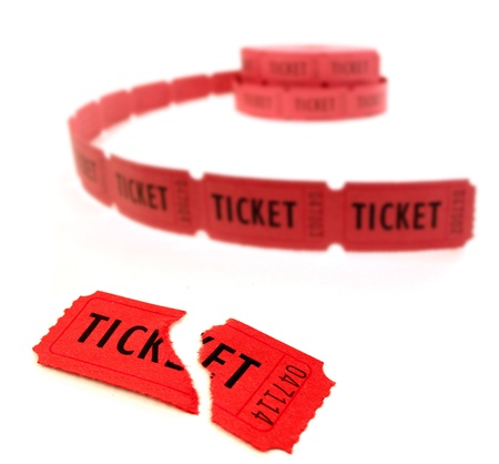 Rolls of red tickets connected together for admission の写真素材