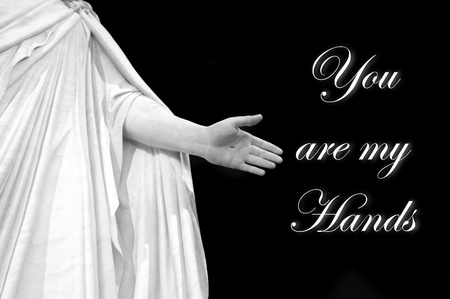 Statue of Hand of Jesus with black background with words you are my handsの写真素材