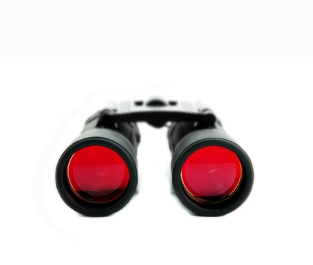 closeup of isolated binoculars with red lensesの写真素材