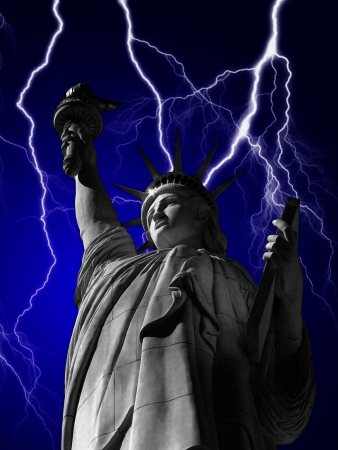 Statue of Liberty at night with stormy lightning boltsの写真素材