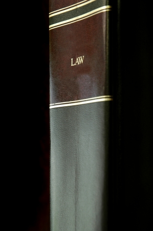 Close up of a single law book of codes and statutesの写真素材