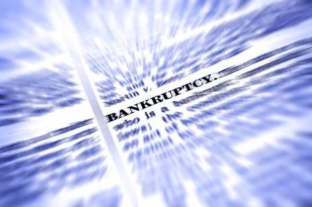 Zooming closeup of definition of the word bankruptcyの写真素材