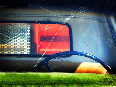 Detail Shot of a broken windshield on a Truck