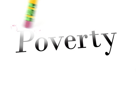 Person using a pencil eraser to erase Poverty from their life so they can start newの写真素材