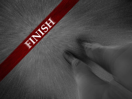 Finish line zoom motion with businessman wearing dress shoes as metaphor for finishing work as a winner    の写真素材