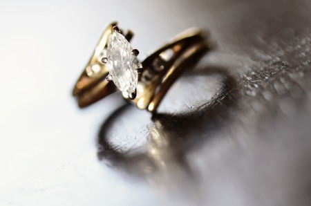 Detail closeup of diamond ring representing love and commitment