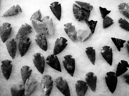 Detail of stone arrowheads representing ancient historyの写真素材