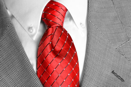 White dress shirt with red tie and suit jacketdetailed closeupの写真素材