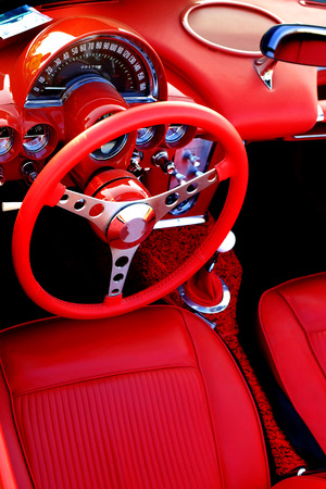 Detail of interior red sports car steering wheel speedometerの写真素材