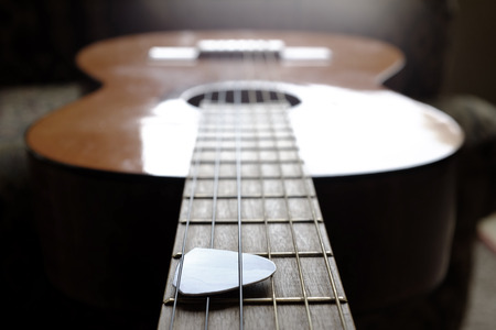 Closeup detail of guitar strings for playing musicの写真素材