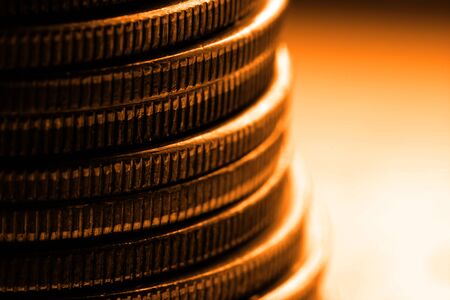 Pile of old coins and bullion with dark backgroundの写真素材