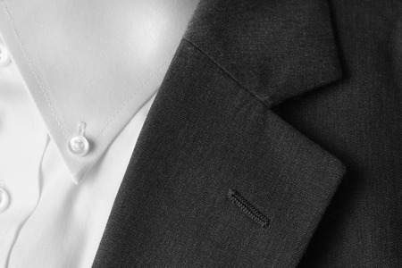 Closeup of suit buttons and lapel for business or formal wear