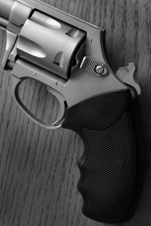Closeup of pistol handgun trigger for shooting self defense or military