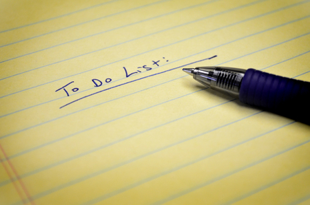 To do list on paper pat with pen in inkの写真素材