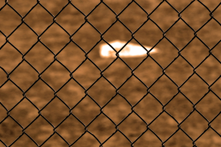 Baseball home plae and backstop chainlink fence wire