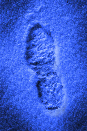 Path for Progress with footprints in the snowの写真素材