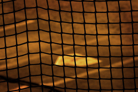 Baseball home plae and backstop chainlink fence wire
