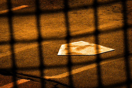 Baseball home plae and backstop chainlink fence wire
