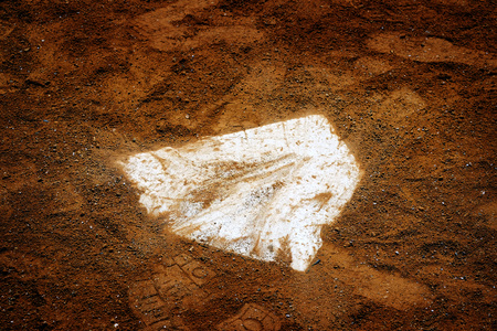 Baseball homeplate home plate in brown dirt for sports american past time