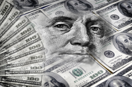 Wealth and Riches represented by American currency bills savings investmentの写真素材