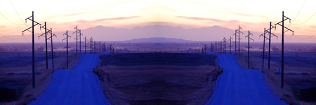 Telephone or power poles in the countryside rural area at sunset sunriseの写真素材