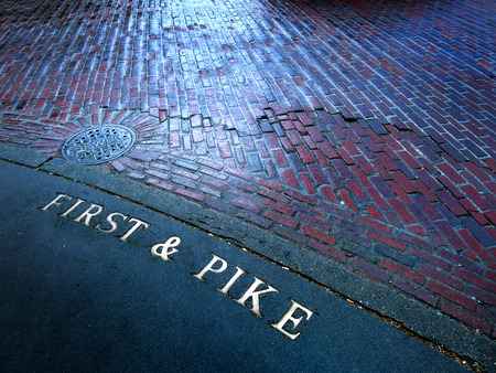 First and Pike Street on corner of road in Seattle Washingtonの写真素材