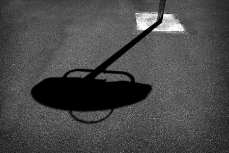 Urban basketball playing in downtown area in big city steet ball ghettoの写真素材