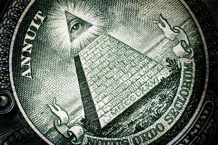 All Seeing Eye pyramid on back of dollar bill american moneyの写真素材
