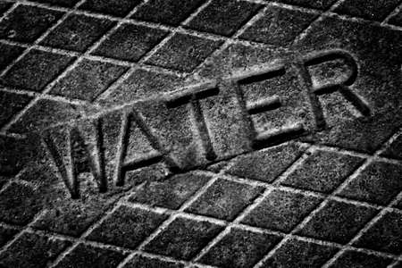 Detail of Iron Water Cover Man Hole Rusty Lidの写真素材