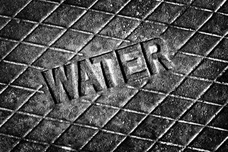 Detail of Iron Water Cover Man Hole Rusty Lidの写真素材