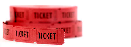 Rolls of red tickets connected together for admissionの写真素材