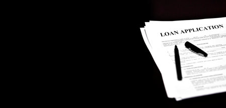 Loan document and agreement with pen for signingの写真素材