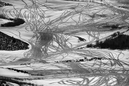 Snow path snowmobiles mountains tracks trailsの写真素材