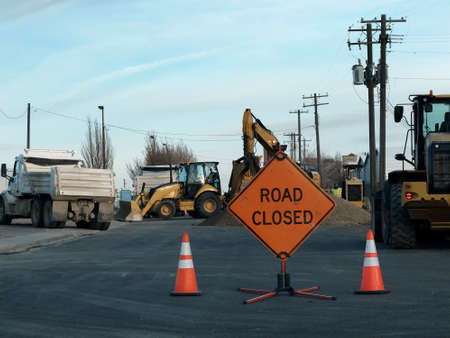 Road closed sign for work construction heavy equipmentの写真素材