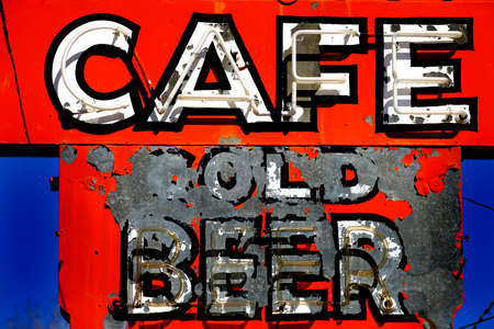 Old worn roadsign cold beer vintage americana on road roadside Cafeの写真素材