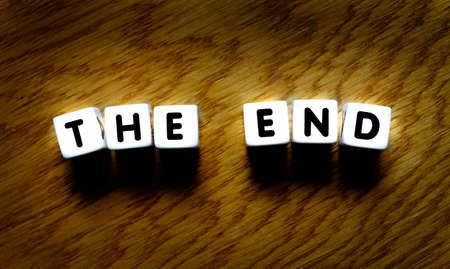 The end spelled out with letters to represent completion of goal or ideaの写真素材