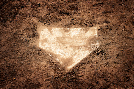 Worn used home plate for baseball sports homeplate baseの写真素材