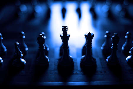 Pieces on chess board for playing game and strategy knight kingdom gamingの写真素材