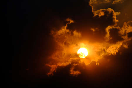 Sunlight sun rays shining through clouds in sky symbolizing hope and redemptionの写真素材