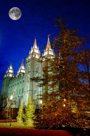 Salt Lake City Mormon LDS Latter-day Saint Temple at night Christmas Lights with full moonの写真素材
