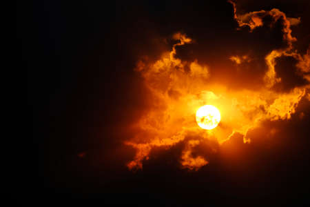 Sunlight sun rays shining through clouds in sky symbolizing hope and redemptionの写真素材