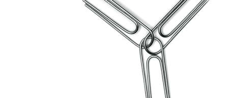 Paperclips attached to represent working together and teamworkの写真素材