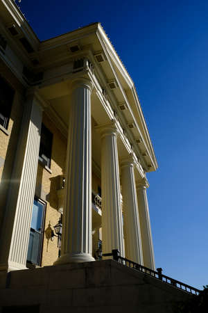 Detail of old courthouse court house building with columns nd architecture and blue skyの写真素材