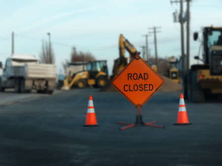 Road closed sign for work construction heavy equipmentの写真素材