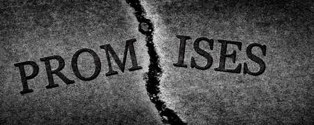 Broken Promises and breached agreement dishonesty represented or symbolized by cracked cementの写真素材