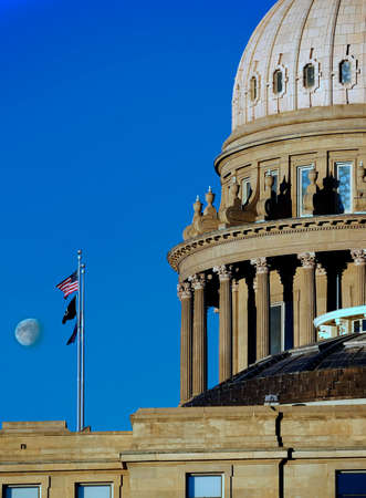 State Capitol Building governing government dome structure legal laws moon sky flagsの写真素材