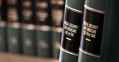 Social Security and Medicaid benefits legal law books on shelf