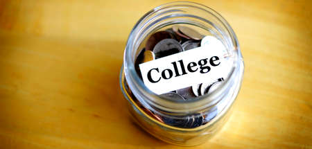 Money jar for savings and investment IRA 401k retirement or college rainy dayの写真素材